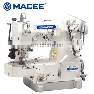MC 600-03 HIGH-SPEED CYLINDER -BED INTERLOCK SEWING MACHINE WITH REAR PULLAR thumbnail-1