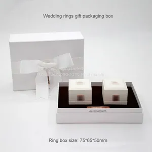 China Dongguan Factory Luxury PU Leather Wedding Rings Box With Custom Branded Metal Logo Tag thumbnail-1