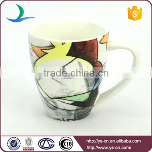 White Decaled Ceramic Tea Cup With Handle thumbnail-3