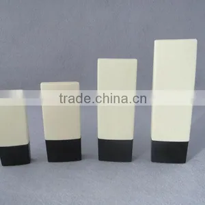 Light Yellow Plastic Cosmetic Bottle With Black Cap thumbnail-1