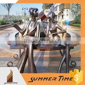 Brass Modern Couple Sitting on Chair Statues thumbnail-1