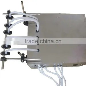 Electric High Accuracy Small Dose 2ml 6 Nozzles Coconut Oil Filling Machine thumbnail-2