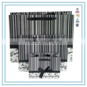 China Supplier High Quality Luxury White Cardboard Paper Bag thumbnail-1
