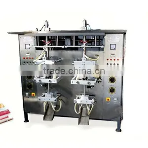 Gravity Filler Machine for Liquid Packing thumbnail-1