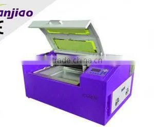 New High Quality Cnc Laser Engraving and Cutting Machine/laser Cutter TJ 4030 thumbnail-1