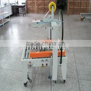 JTE-05 Full Auto Side Belts Driven Carton Sealer thumbnail-1
