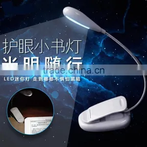 Extra-Bright 4 LED Book Reading Light Easy Clip 2 Brightness Settings, Soft Padded Clamp. Perfect for Bookworms thumbnail-1