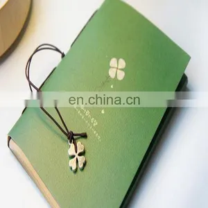 Competitive Price Customized Creative Kraft Paper Notebook /Lucky Grass Cover Leather Bound Notebook thumbnail-1