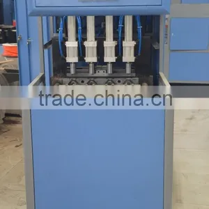 High Quality Semi Automatic 4 Cavities Drinking Water Bottle Blow Molding Machine thumbnail-4