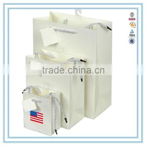 China Custom White Luxury Paper Bag & Brand Paper Bag Printing Logo With Handles thumbnail-1