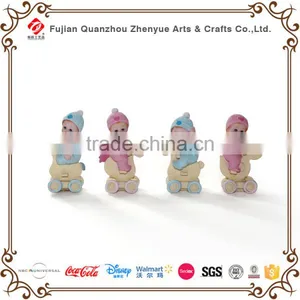 Polyresin Baby Sculpture With Chair Shoes Horse Photo Frame Leaf Holding Baby Figurine Resin Cute Baby Statue thumbnail-6