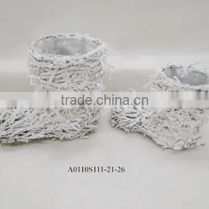 Indoor Rattan Boot Planter With Snow thumbnail-1