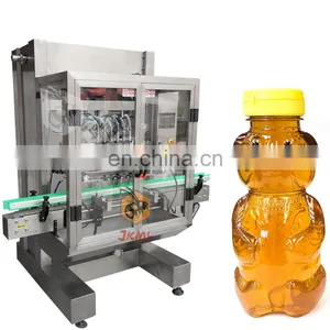 Hot Salt Glass Bottle Piston Honey Filling Machine With Labeling Machine thumbnail-1