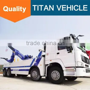 Sinotruck Howo Heavy Duty Flatbed Rotator Tow Truck Wrecker Wheel Lift for Sale With Arm Crane thumbnail-1