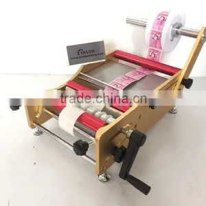 Manual Round Bottle Sticker Label Machine Labels on Round Bottle/round Jar/cylinder thumbnail-5