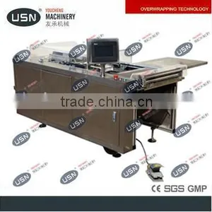 Low Price Semi-auto Overwrapping/Packing Machine thumbnail-1
