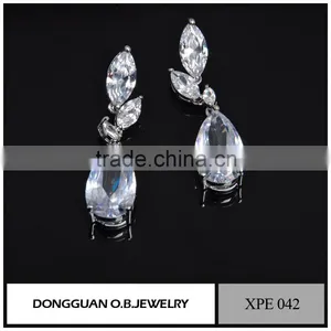 Simple Gold Earring Designs for Women With Big Diamond Earring thumbnail-3