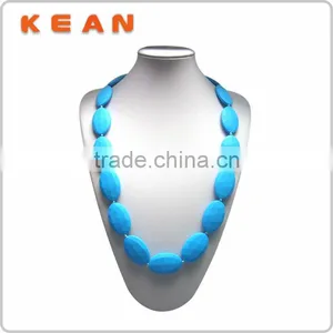 Turqoise Silicone Teething Necklace for Mom to Wear and Baby to Enjoy thumbnail-1