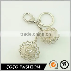 China Souvenir Clear Thread Design Silver Plated Pearl Metal Keychains Wholesale Supplier's Choice thumbnail-1