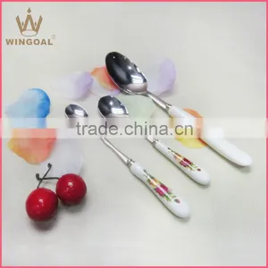 Stainless Spoon With Porcelain Handle thumbnail-1