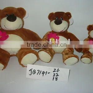 Cute Teddy Bear Plush Toy With a Flower thumbnail-1