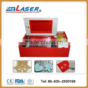 China Embroidery Laser Cutting Machine/laser Drawing Machine/mini Laser Engraving Machine thumbnail-1