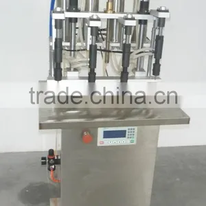 China Guangzhou Factory Small Perfume Bottle Four Head Filling Machine/equipment With Negative Pressure for Sale thumbnail-1