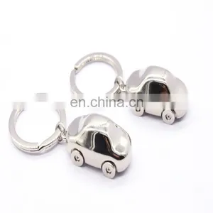 Polished Nickel Key Shape Keychain thumbnail-5