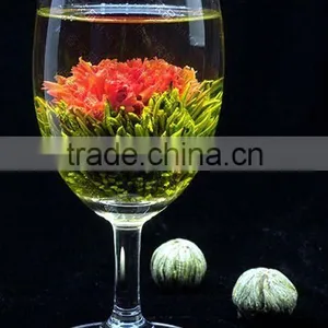 Blooming Tea With Golden Flower Blossoming thumbnail-1