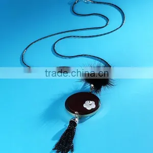 Winter Simple Pom Pom Necklace Flower Decorated Round Disc Pendant Necklace Long Tassel Sweater Necklace thumbnail-2