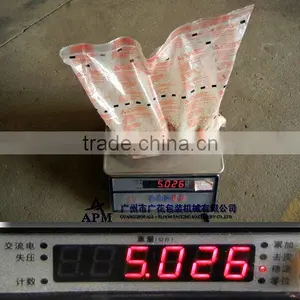 5.0kg/bag Rice Automatic Filling and Sealing Machine thumbnail-1