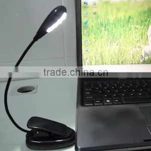 Extra-Bright 4 LED Book Reading Light Easy Clip 2 Brightness Settings, Soft Padded Clamp. Perfect for Bookworms thumbnail-2