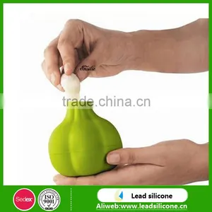 Magic Kitchenware Silicone Garlic Peeler Silicone Peeling Presses, Garlic Peeling Devices thumbnail-1