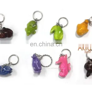 Carved Tagua Seed Keychains With Animal Shapes thumbnail-1
