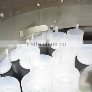 Automatic 5 Gallon Gasket Into the Capping Machine thumbnail-1
