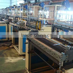 SHXJ-E600 Series Full Automatic T-shirt Hot Sealing Cold Cutting Bag Making Machine thumbnail-1