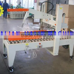Semi-Automatic Flaps Folding And Side Belts Driven Sealer thumbnail-1