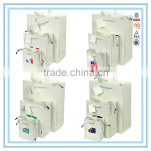 China Custom White Cardboard Paper Bag Shopping Paper Bag Paper Gift Bag With Handles thumbnail-6