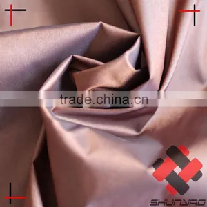 400T Shiny Nylon Polyester Fabric Blended 20DX20D Ultralight N/P Taffeta Fabric for Down Coat thumbnail-1