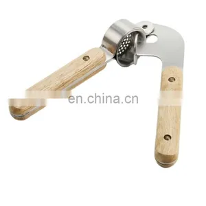 Hot Sale Stainless Steel Garlic Press With Wooden Handle thumbnail-1