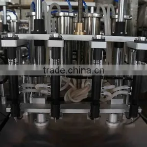 China Guangzhou Factory Small Perfume Bottle Four Head Filling Machine/equipment With Negative Pressure for Sale thumbnail-4
