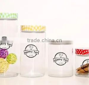 Round Glass Storage Jar With Decal and Metal Lid thumbnail-1