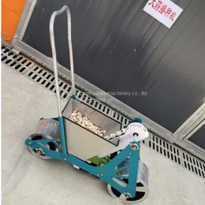 1 Row Manual Manual Garlic Planter Hand Push Garlic Planter Machine For Greenhouse thumbnail-1