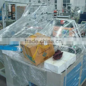 SHXJ -E Full Automatic T-shirt Hot-sealing Cold-cutting Bag Making Machine thumbnail-1