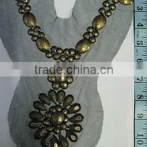 VNECK NECKLINE, MOTIF, SEW ON, APPLIQUE ACRYLIC STONE WITH BRASS COLOR PLATEAcrylic Stone VNeck, Neckline Motif, Mesh Base Stone thumbnail-1