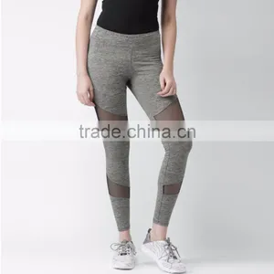 Women Wearing Grey Melange Net Panelled Tights Seamless Yoga Pants thumbnail-1