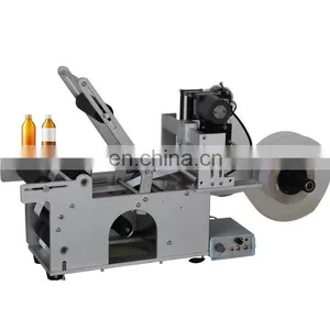 High Quality Semi Automatic Horizontal Cold Glue Round Bottle Labeller Sticker Labeling Machine thumbnail-1