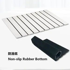 Super Absorbent Non-slip Rubber Base Foldable Roll Up Diatomite Stone Bath Mat Supplier thumbnail-1