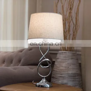UK Simple Geometric Modeling Custom Iron Base Hotel Desk Light Cheap Silver Nightstand Lamp for Home Table thumbnail-7