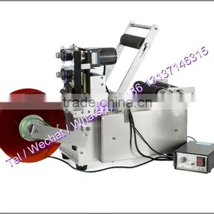 Flat Round Bottle Tube Glue Labeling and Coding Machine thumbnail-6